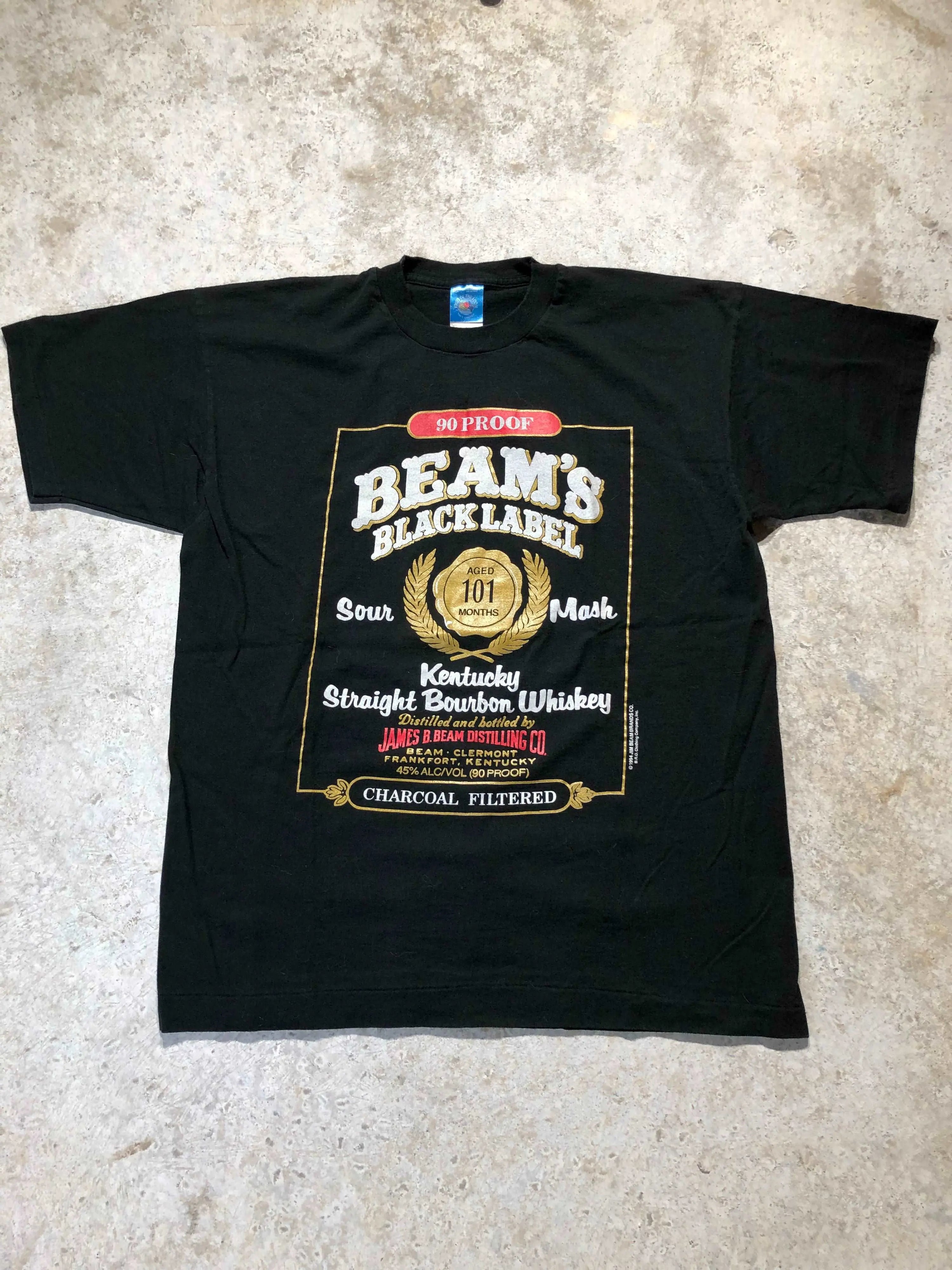 Vintage X-Large black Fruit of the Loom tee with a 1994 Jim Beam Black Label whisky graphic.