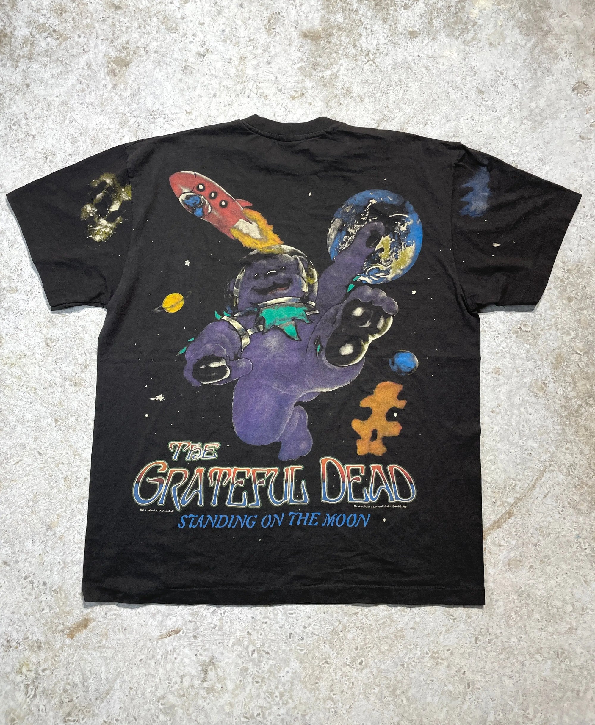 Black 1995 Grateful Dead "Standing on the Moon" X-Large tee with all-over space print and purple bear.