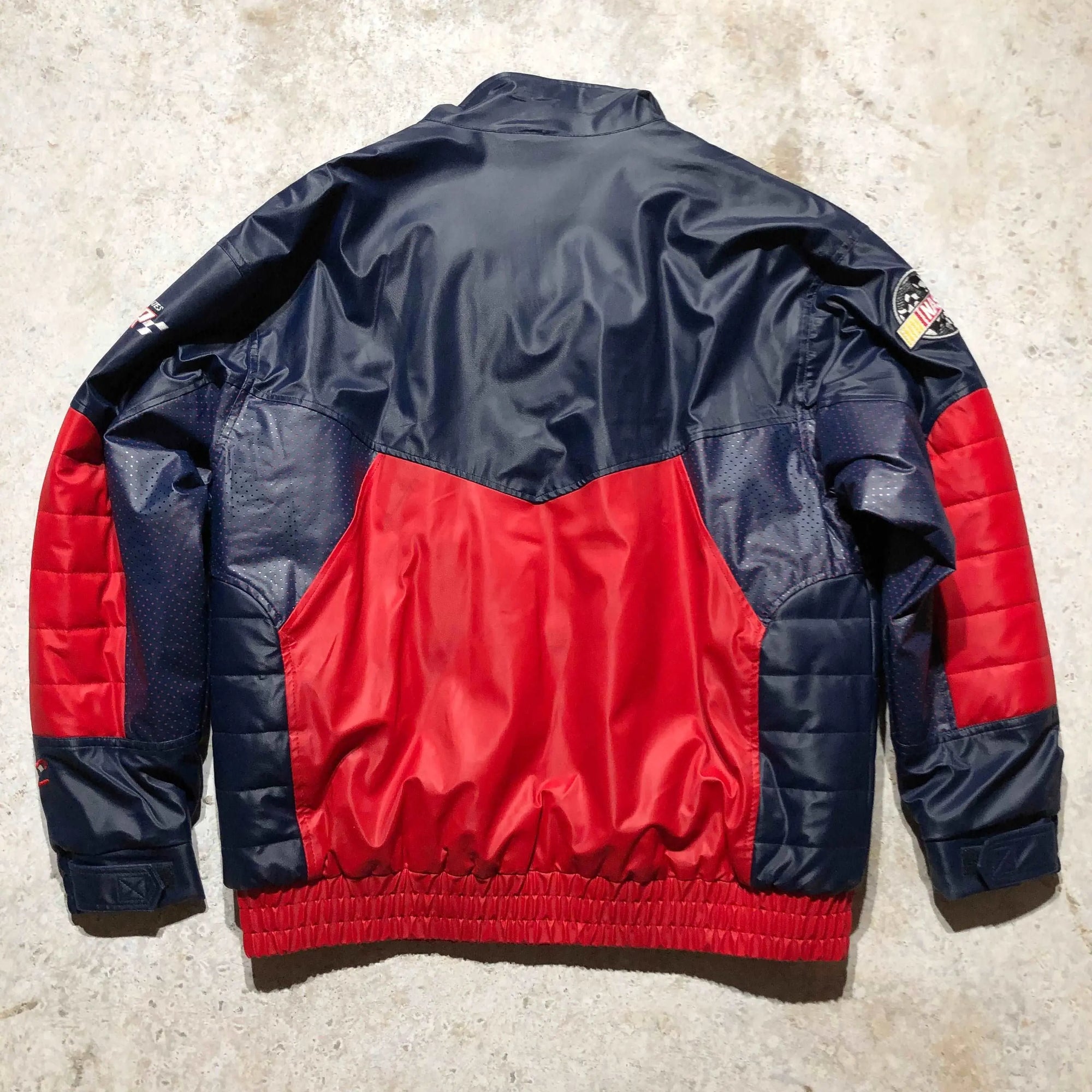 Vintage 2000 Nascar Ford Racing X-Large jacket, navy blue and red with quilted sleeves.
